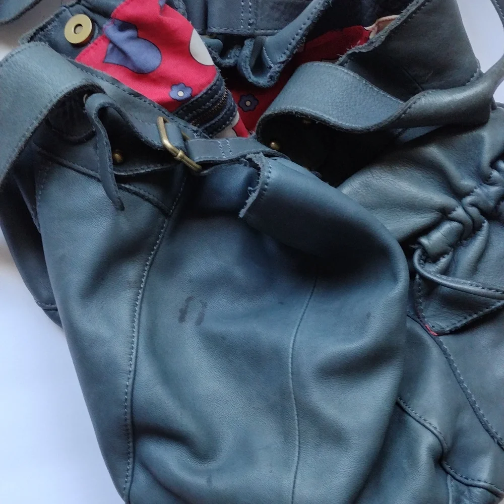 Anthropologie,Lucky Penny, leather purse with heart lining .